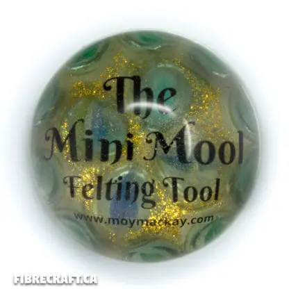Top view of the handcrafted wet felting tool with waterproof resin and glass marbles